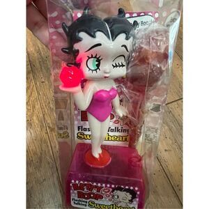 vintage Betty Boop figurine with flashing lights and sound.